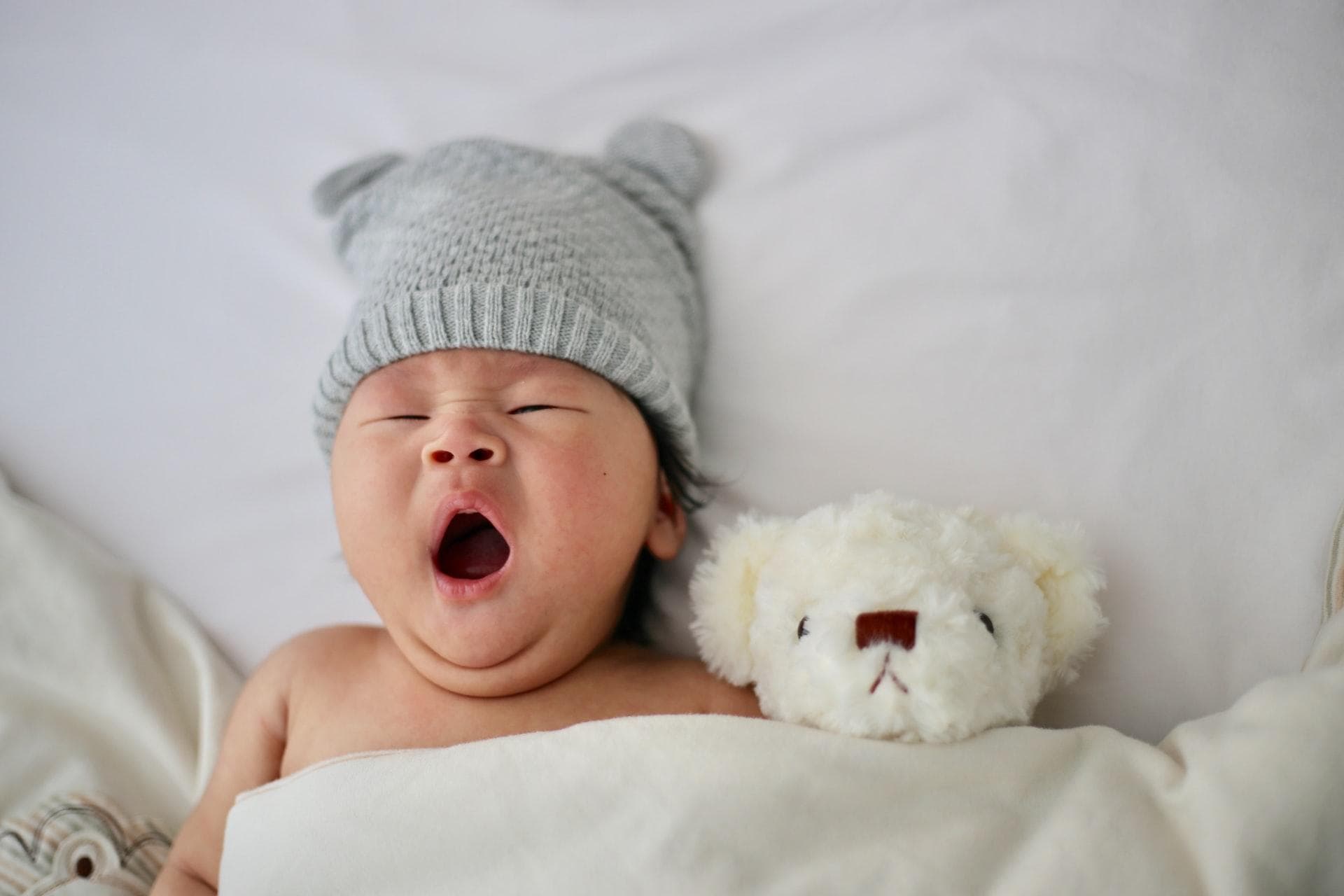 Baby and teddy bear