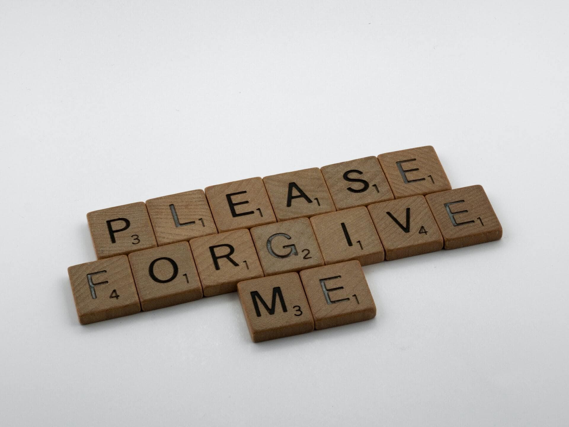 Please forgive me, written in children's blocks
