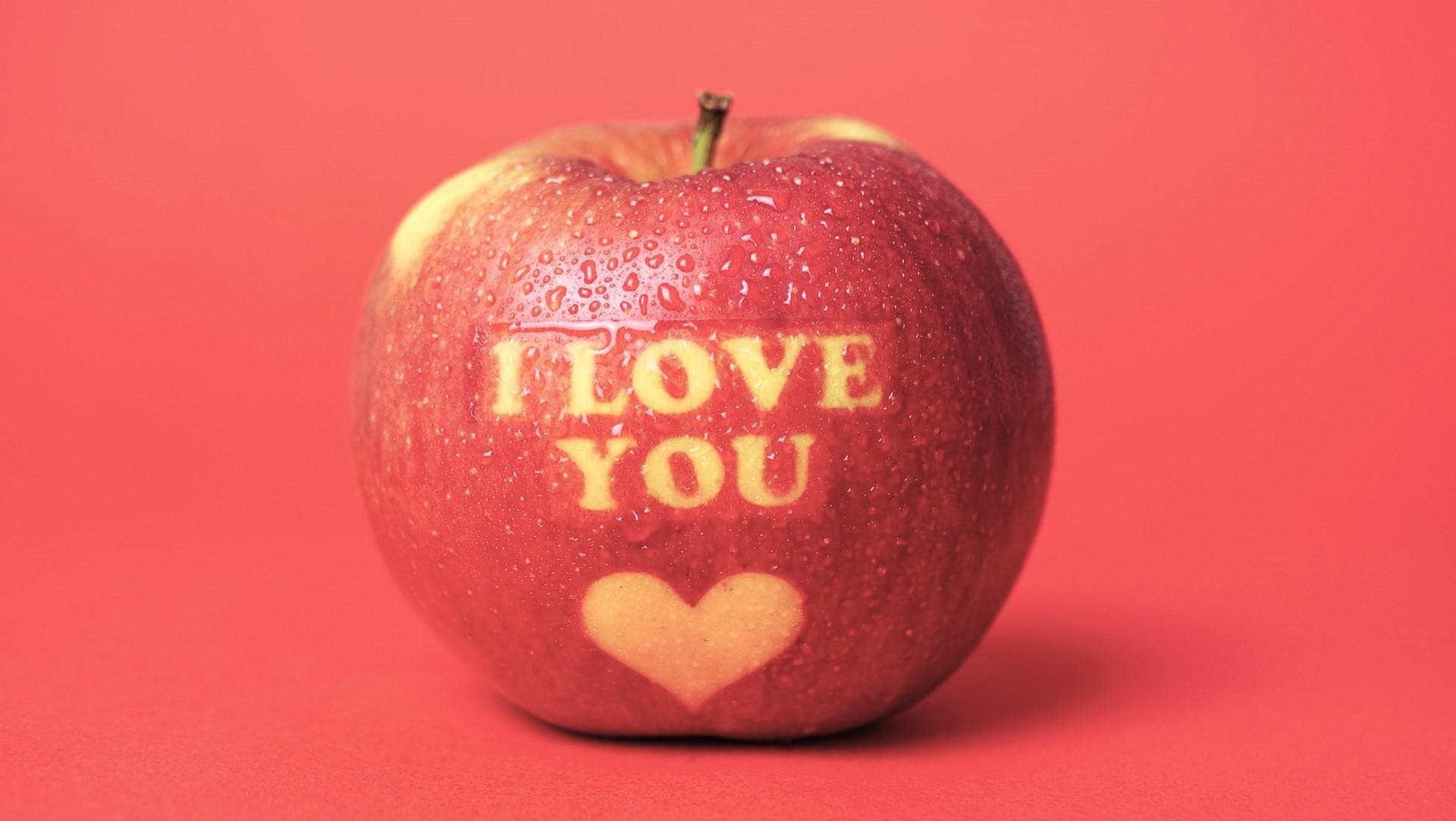 I love you written on an apple