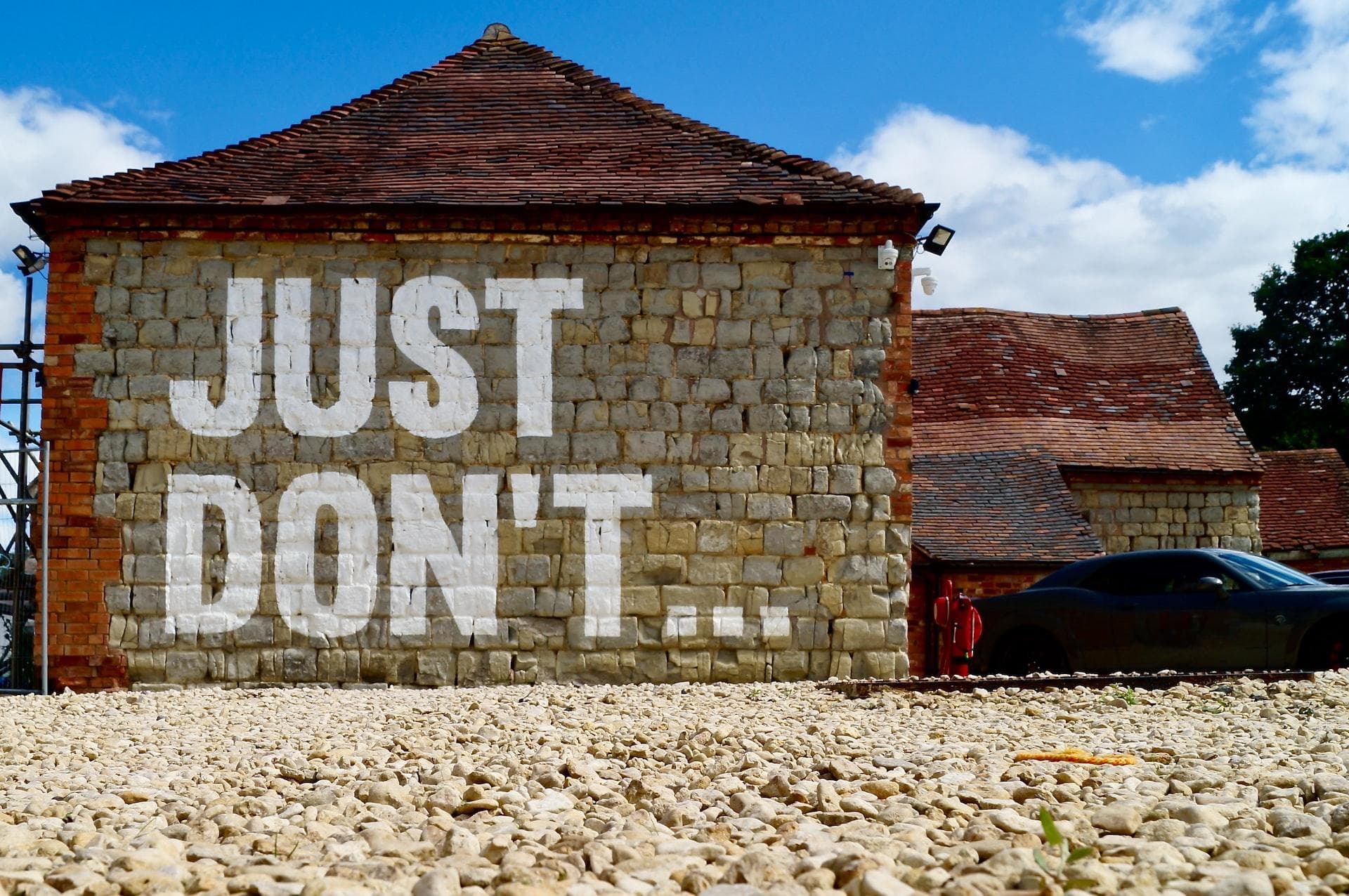 Wall painting saying 'just don't